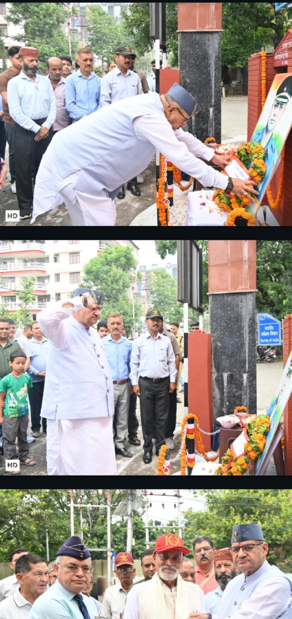 अमर बलीदनी मेजर भूपेन्द्र कण्डारी की 23वीं पुण्यतिथि पर हाथीबड़कला स्थित शहीद द्वार में सैनिक कल्याण मंत्री गणेश जोशी शहीद के चित्र पर पुष्पांजलि अर्पित करते हुए।  और नीचे सलामी देकर श्रद्धांजली देते।  श्रद्धांजलि कार्यक्रम के दौरान सैनिक कल्याण मंत्री गणेश परिजनों एवं पूर्व सैनिकों के साथ।